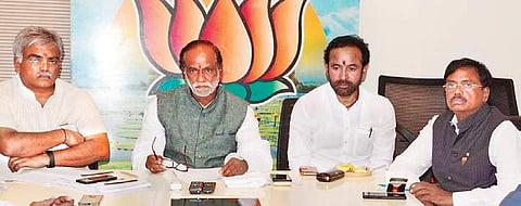 BJP leaders K Laxman, G Kishan Reddy and G Vivek at the core committee meeting