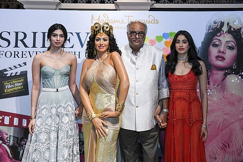 Producer Boney Kapoor and daughters Khushi and Jhanvi kapoor unveil late actress Sridevi's wax statue (Photo | Twitter/ @LMKMovieManiac)