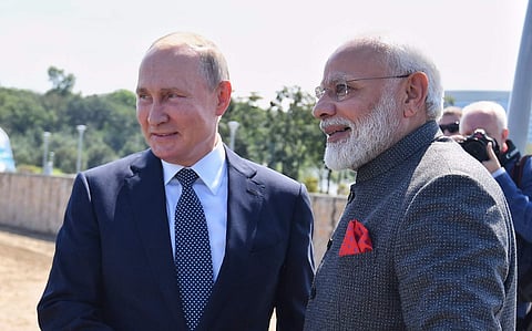 Russian President Putin welcomes Indian PM Narendra Modi in Vladivostok. (Photo | MEA / Twitter)