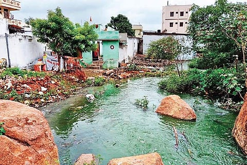 Sewage water flows in an open drain in Gopi Nagar in Chandanagar, where two people died due to viral fever (Photo |EPS)