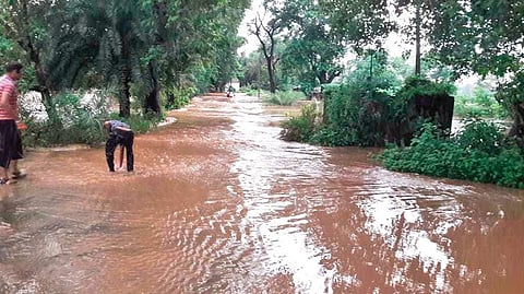 A waterlogged road in Matikhal village under Kalampur block I Express