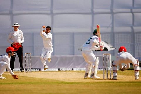 Rashid Khan bowls against Bangladesh. (Photo | Twitter/ICC)