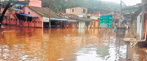 Inundated homes in Dandeli town on Sunday |Express