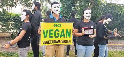 Animal rights activists taking part in the awareness programme held at Panampilly Nagar on Sunday | Express