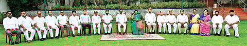 Chief Minister K Chandrasekhar Rao and Governor Tamilisai Soundararajan pose for a group photo along with newly sworn-in ministers at Raj Bhavan in Hyderabad on Sunday. (Photo | EPS)