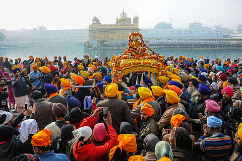 Devotees throng Golden Temple in Amritsar to mark the first day of New Year 2020. (Photo | PTI)