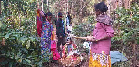 K Chinnalamma with her newborn with her relatives. (Photo | Express)