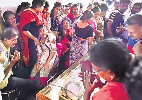 Relatives, friends and well-wishers of Eva Antony break down in front of her body kept at her rented house at Kaloor on Thursday