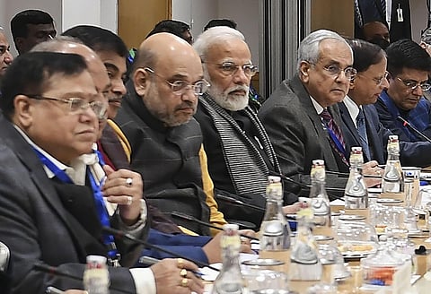 Prime Minister Narendra Modi with his cabinet colleagues Amit Shah, Nitin Gadkari and Piyush Goyal during an interaction with economists at NITI Aayog, New Delhi. (Photo | PTI)