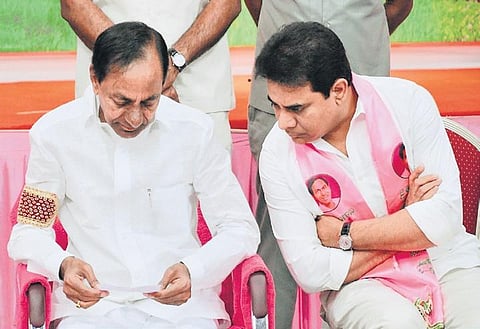Chief Minister K Chandrasekhar Rao and MAUD Minister KT Rama Rao at a meeting with partymen ahead of municipal polls at Pragathi Bhavan on Thursday