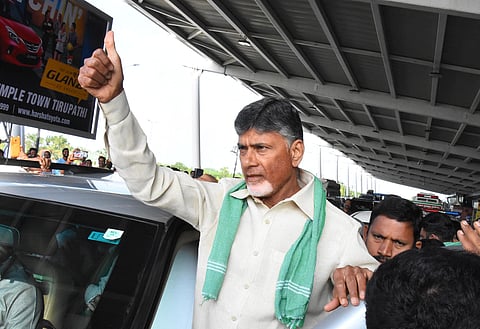 TDP chief N Chandrababu Naidu greeting public at Renigunta airport (Express Photo by Madhav K)