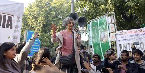 Author Arundhati Roy addresses a gathering during a protest against the CAA outside the Jamia Millia Islamia University in New Delhi on Saturday Jan. 11 2020. (Photo | Arun Kumar P/EPS)