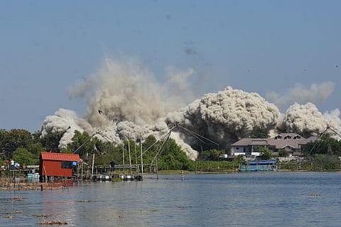 Ensuring the implementation of Supreme Court order, Jain Coral Cove, one of the five apartment towers which violated CRZ norms, demolished through controlled implosion at Maradu in Kochi on Sunday. (Photo | BP Deepu/EPS)