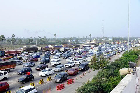Heavy rush of vehicles at Pantangi toll gate in Nalgonda district on Saturday| Express