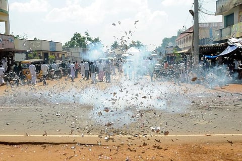 Supporters of the newly-elected district panchayat president in Pudukkottai burst crackers in celebration| Express