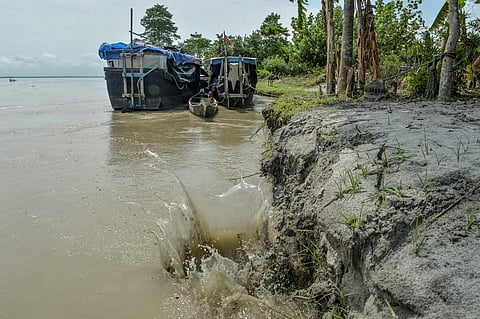 This picture taken on September 17, 2019 shows soil erosion caused by the waters of Brahmaputra river at Majuli island in Assam. (Photo | AFP)