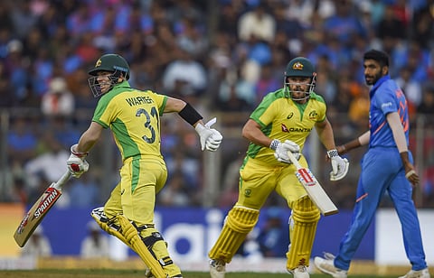 Australian batsmen Aaron Finch and David Warner run between the wickets during the first one day international ODI cricket match against India at the Wankhede Stadium in Mumbai. (Photo | PTI)