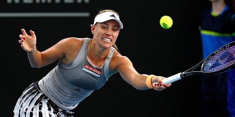 Angelique Kerber of Germany plays a shot during her match against Samantha Stosur of Australia at the Brisbane International tennis tournament in Brisbane. (Photo | AP)