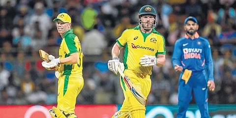 Australia openers David Warner (L) and Aaron Finch smashed unbeaten tons against India to chase down 255 in 37.4 overs, in the first ODI in Mumbai on Tuesday. (Photo | AFP)