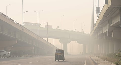 An auto plying along a road under heavy smog conditions in New Delhi on November 12 2019. | (Photo | Parveen Negi/EPS)