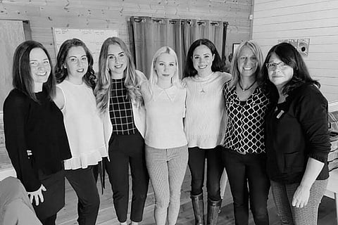 Canadian non-profit organisation Justice for Girls shows Britain's Meghan, Duchess of Sussex (3rd from right) posing during a visit to the organisation in Vancouver (Photo| AFP)
