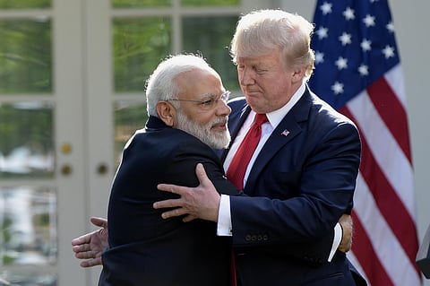 President Donald Trump and Indian Prime Minister Narendra Modi hug while making statements in the Rose Garden of the White House in Washington. (Photo | AP)