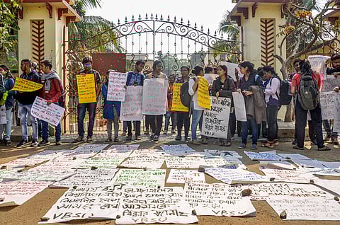 Left-wing students shout slogans outside the central office of Visva-Bharati during a protest against university authorities after a clash between TMCP Left front students in Birbhum district of West Bengal Thursday Jan. 16 2020. (Photo | PTI)