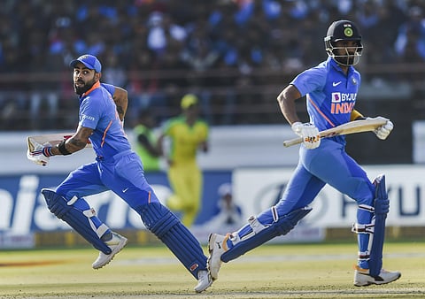 Indian batsman KL Rahul and Virat Kohli run between the wickets during the second one day international ODI cricket match between India and Australia. (Photo | PTI)