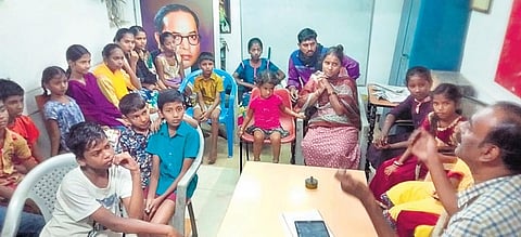 Students taking part in the free English grammar classes conducted at Kamarajapuram in Coimbatore. (Photo | EPS)