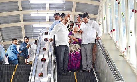 Senior citizens along with Bengaluru Central MP PC Mohan and Mayor M Gautam Kumar at the inauguration of the escalators at Krantivira Sangolli Rayanna Railway Station in Bengaluru on Wednesday | SHRIRAM BN