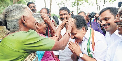 Leader of Opposition Ramesh Chennithala interacts with the tribal community of Edamalakkudy panchayat on Wednesday | EXPRESS