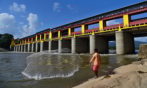A local resident casts his fishing net at the Bhoothathankettu Reservoir in Kochi. (File Photo | EPS)