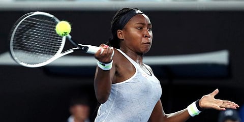 United States' Cori 'Coco' Gauff makes a forehand return to compatriot Venus Williams during their first round singles match at the Australian Open tennis championship in Melbourne. (Photo | AP)