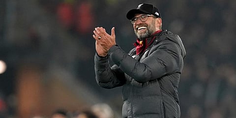 Liverpool's manager Jurgen Klopp celebrates after his team won the English Premier League soccer match between Liverpool and Manchester United at Anfield Stadium in Liverpool. (Photo | AP)
