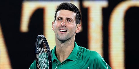 Serbia's Novak Djokovic celebrates after defeating Germany's Jan-Lennard Struff in their first round singles match the Australian Open tennis championship in Melbourne. (Photo | AP)