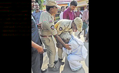 A Mandadam man pleads with police to be allowed to meet local MLA. (Photo | Prasant Madugula, EPS)