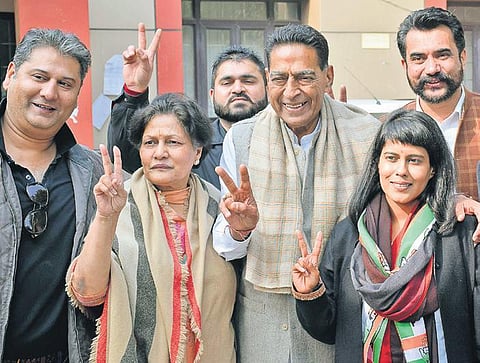 State Congress chief Subash Chopra’s daughter Shivani, along with supporters, after filing nomination papers from Kalkaji constituency. (Photo | EPS)
