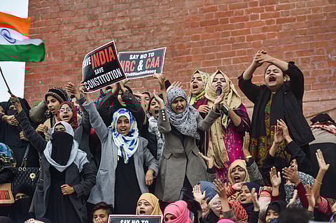 Muslim women with children stage a protest against CAA and NRC near Ghataghar in old Lucknow Saturday Jan. 18 2020. (Photo | PTI)
