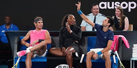 From left, Rafael Nadal of Spain, Serena Williams of the United States and Novak Djokovic of Serbia participate in the Rally For Relief at Rod Laver Arena in Melbourne. (Photo | AP)
