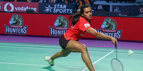 PV Sindhu in action against Priyanshu Rajawat during during second day of Star Sports Premier Badminton League 2020 in Chennai. (Photo | PTI)