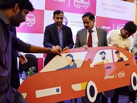(From left) RedBus CEO Prakash Sangam, HMRL MD NVS Reddy and HMRL chief engineer Raju DVS during the launch of Carpool and Bikepool service for metro commuters by Redbus in Hyderabad. (Photo| S Senbagapandiyan, EPS)