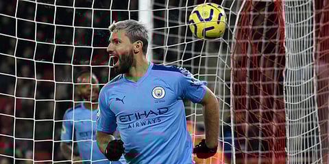 Manchester City's Sergio Aguero celebrates after scoring his side's opening goal during the English Premier League soccer match between Sheffield United and Manchester City at Bramall Lane in Sheffield. (Photo | AP)