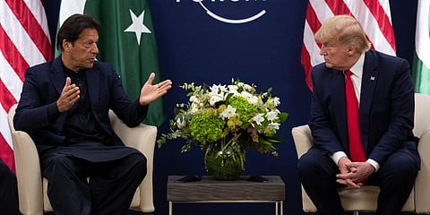 President Donald Trump listens during a meeting with Pakistani Prime Minister Imran Khan at the World Economic Forum. (Photo | AP)
