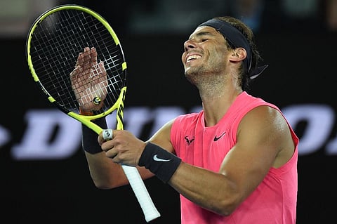 Spain's Rafael Nadal reacts after a point against Argentina's Federico Delbonis during their men's singles match on day four of the Australian Open. (Photo | AFP)