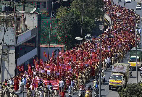 Anganwadi workers take out a rally in Bengaluru on Thursday. (Photo | Meghana Sastry, EPS)