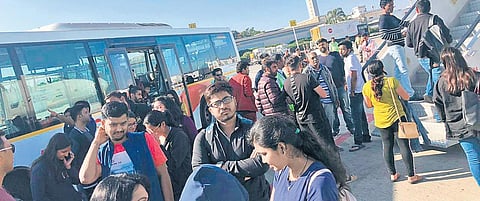 The passengers of Flight no G8-041 wait on the tarmac of Kempegowda Internatial Airport, in Bengaluru on Friday | EXPRESS