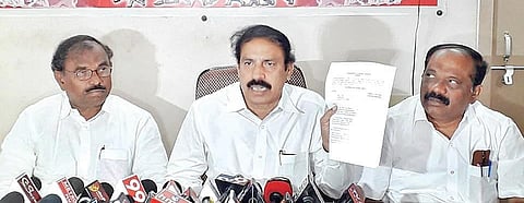 CPI State secretary K Ramakrishna addresses a press conference.