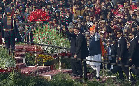 PM Narendra Modi and President Ram Nath Kovind with Chief Guest President of Brazil Jair Messias Bolsonaro move to the podium to witness the 71st Republic Day Parade. (Photo | EPS/Shekhar Yadav)