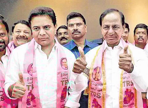 Chief Minister K Chandrasekhar Rao and TRS working president KT Rama Rao celebrating party’s victory in municipal elections at Telangana Bhavan on Saturday.