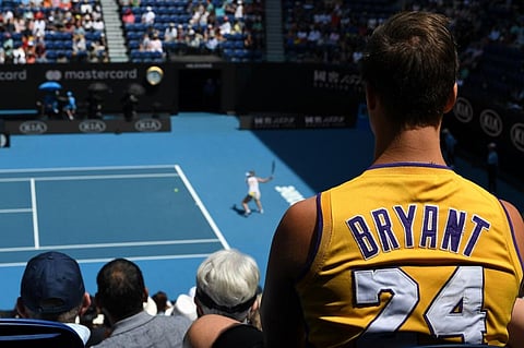 A spectator in NBA legend Kobe Bryant jersey at the Australian Open tennis tournament in Melbourne on January 27, 2020. (Photo | AFP)